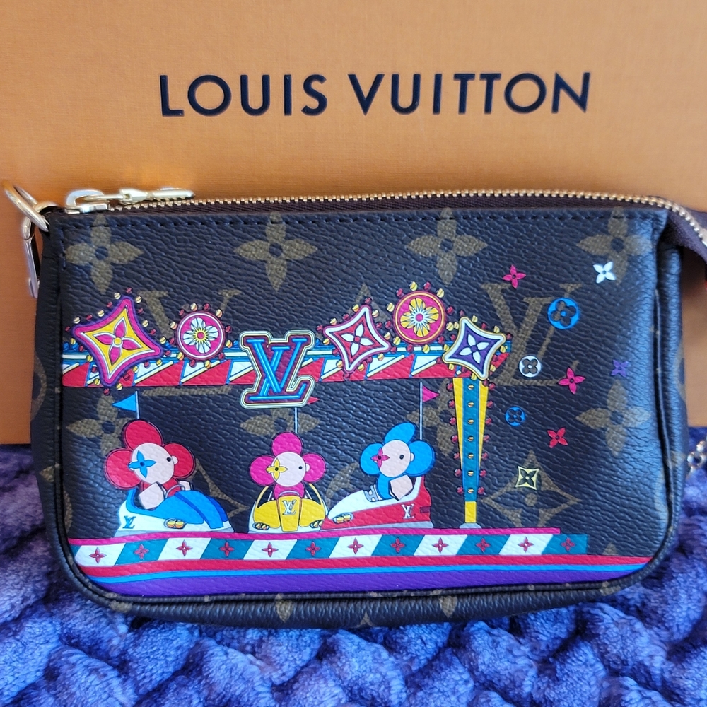 Louis Vuitton Vivienne Mini Pochette Monogram Limited Holiday Edition New Tags.